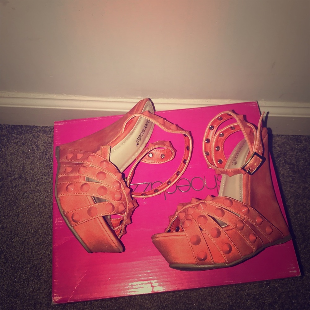 Size 6.5 pairs of Eleanor wedges from shoesdazzle